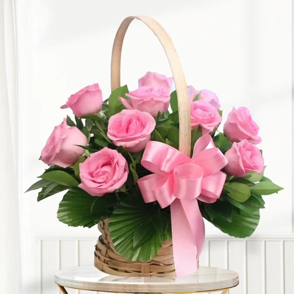 Pink roses basket congratulations arrangement in Dubai