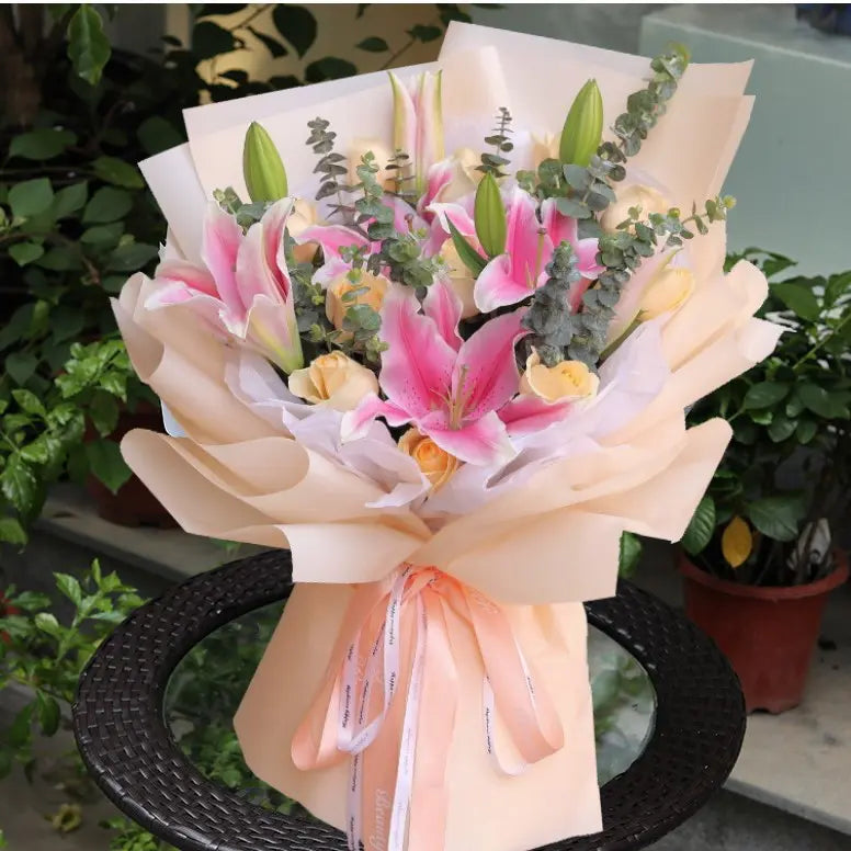 Lilies and Champagne Roses