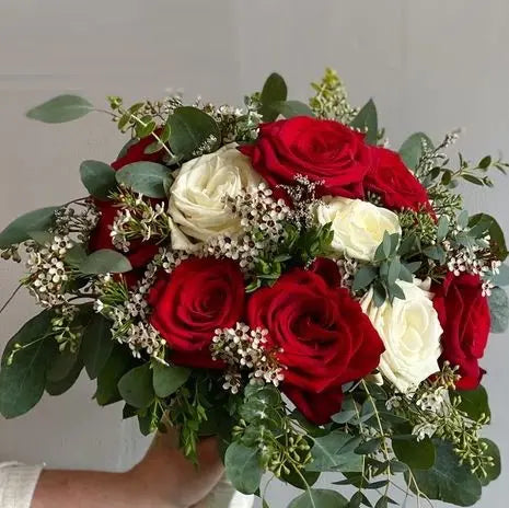 Red and White Bridal Bouquet With Hanging Eucalyptus