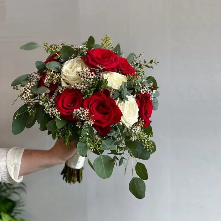 Red and White Bridal Bouquet With Hanging Eucalyptus