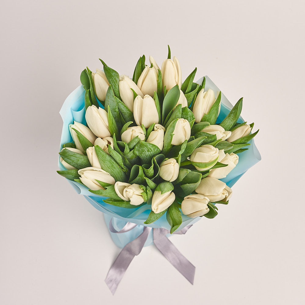 25 White Tulip Bouquet With Blue Wrapping